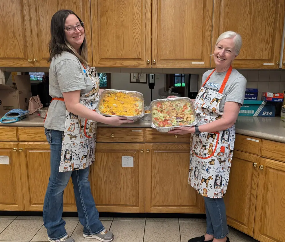 volunteers preparing a meal