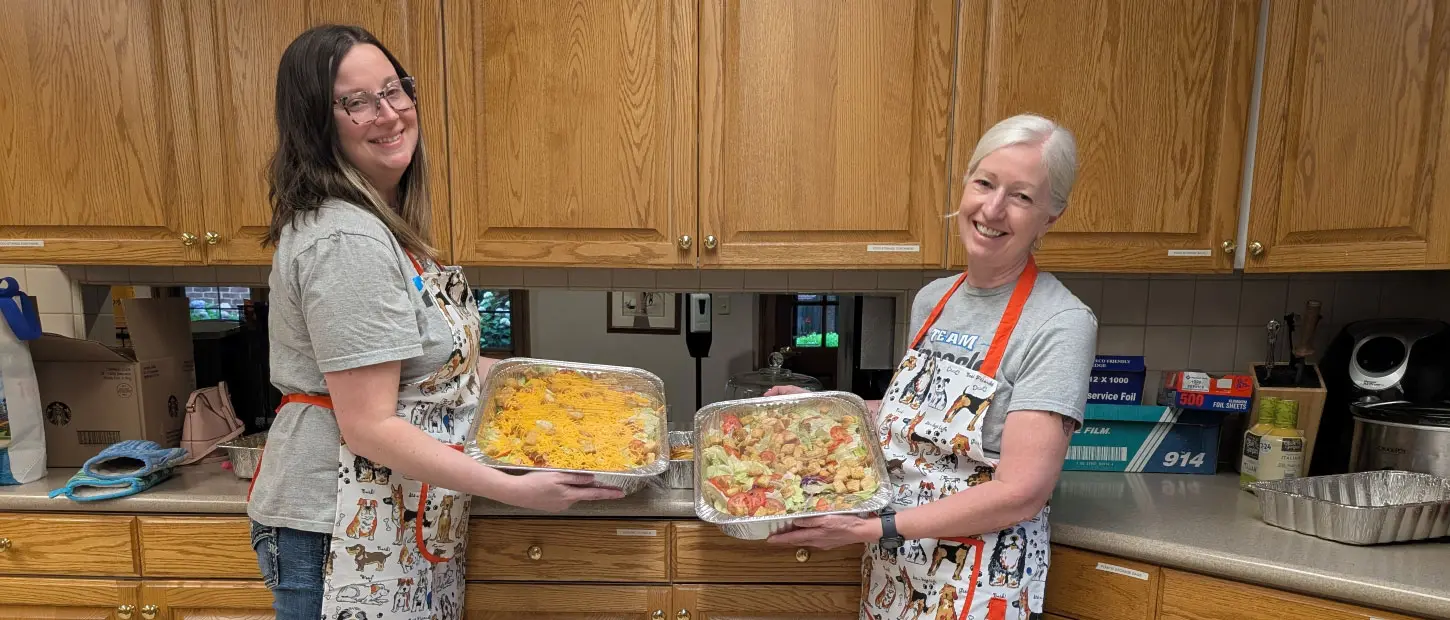 volunteers preparing a meal