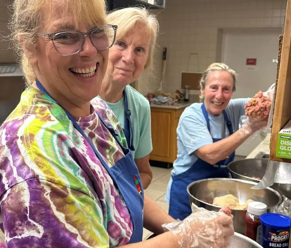 volunteers preparing a meal