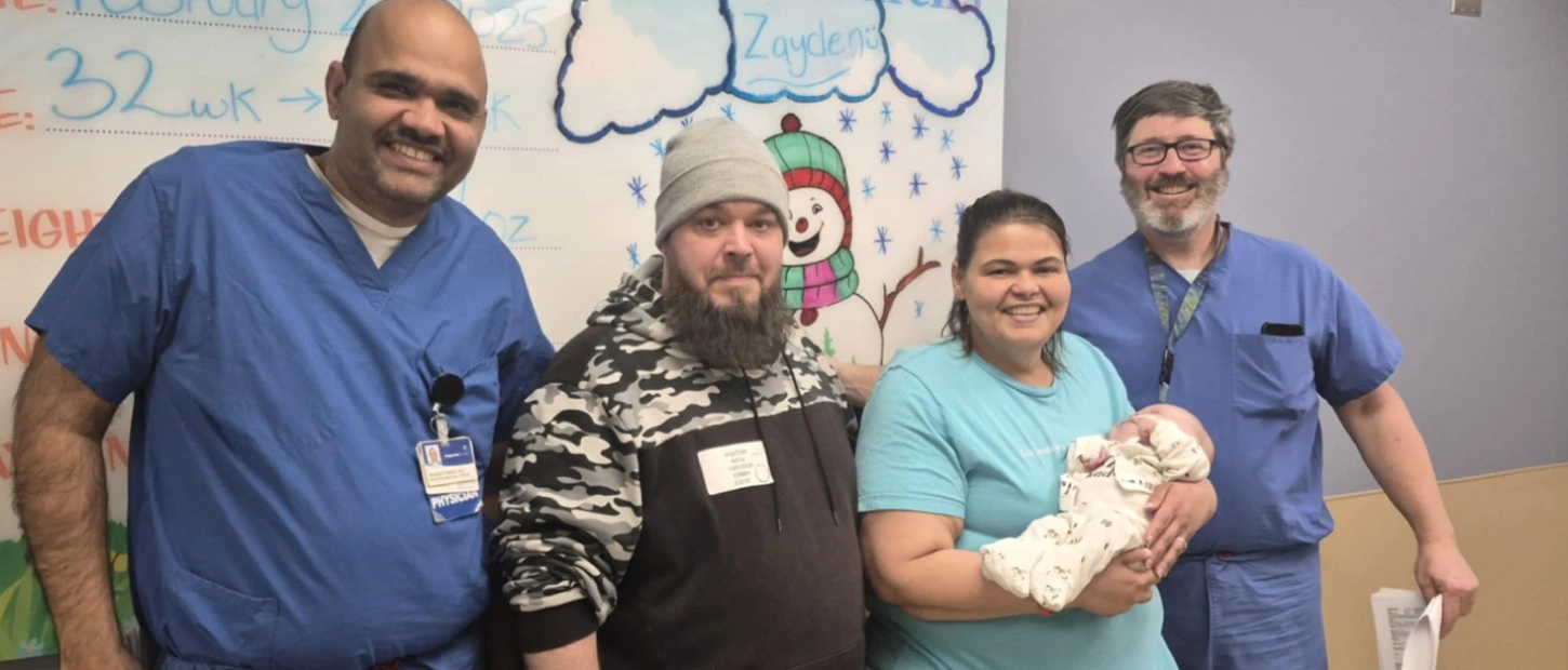 medical professionals with a family and small child going home after receiving care
