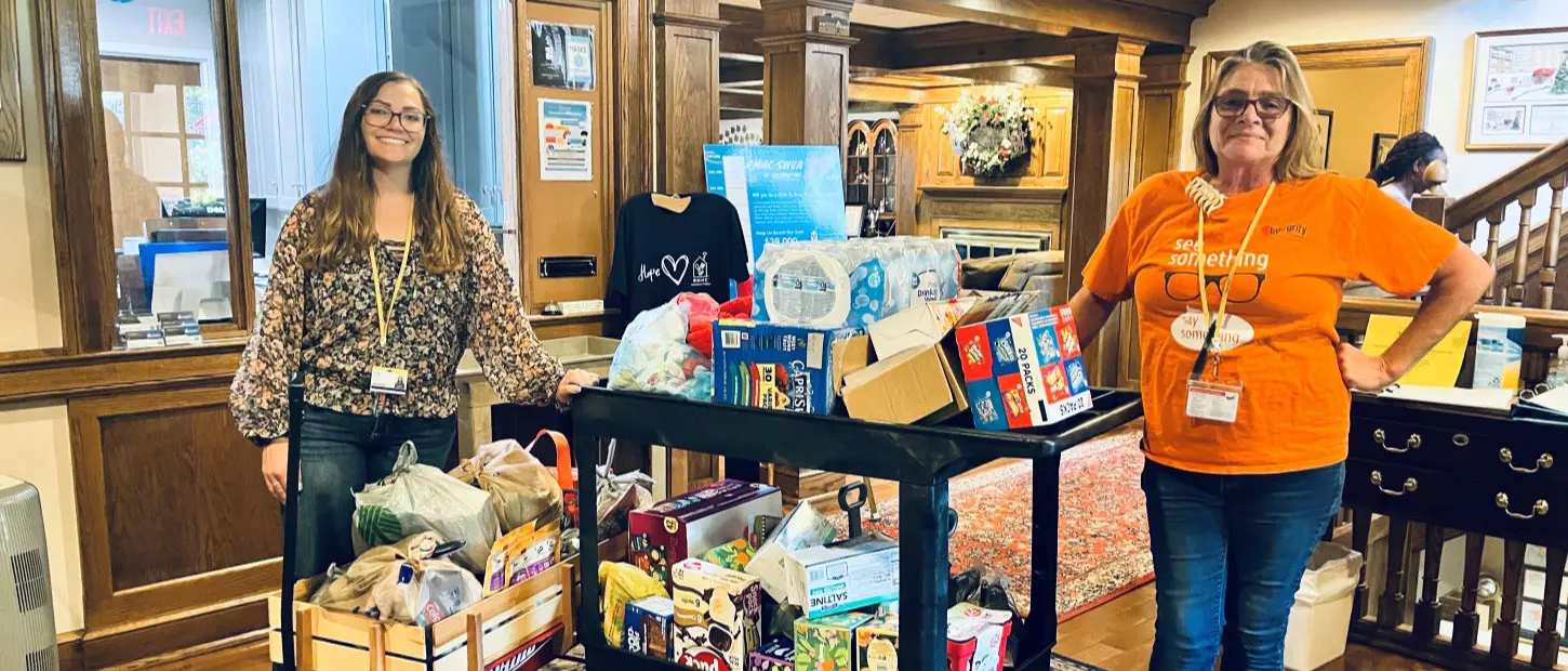 volunteers with donations